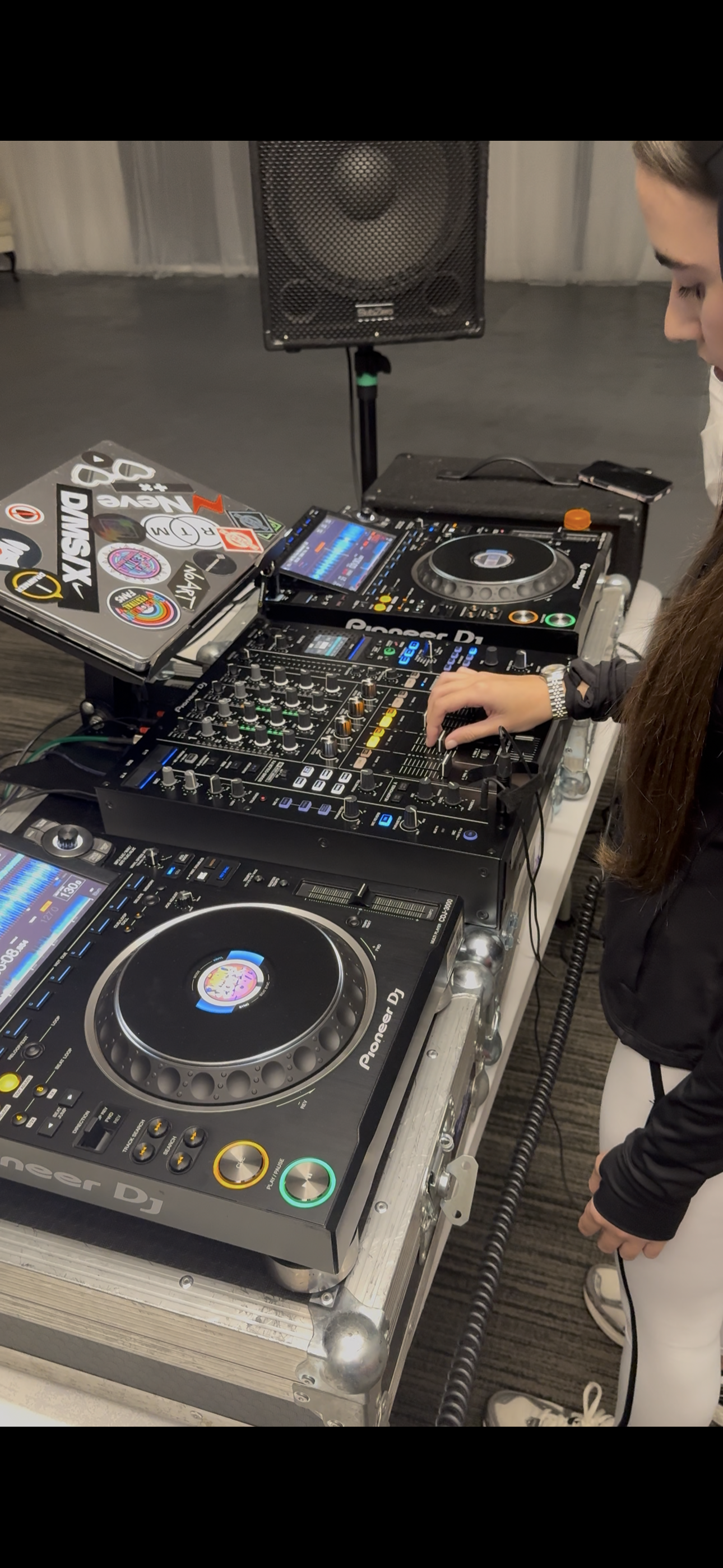 Participants learning to DJ