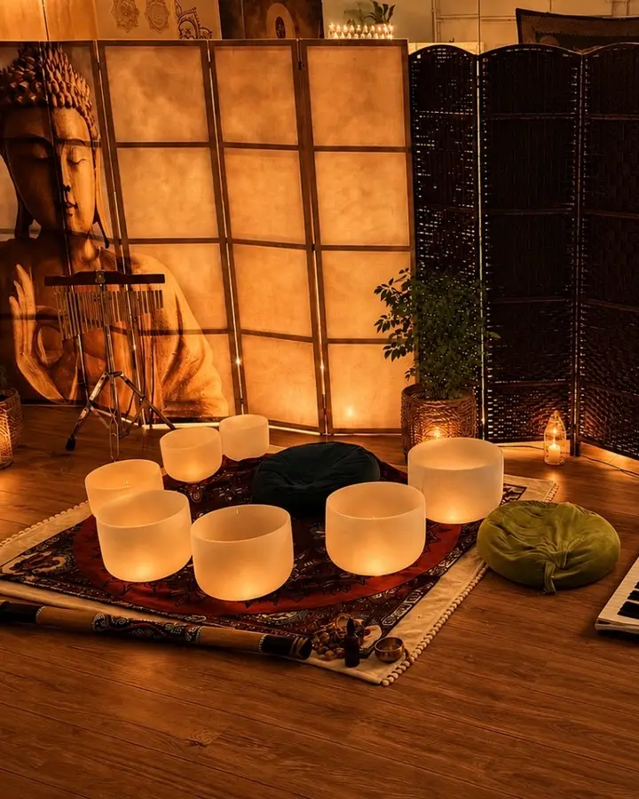 Crystal singing bowls set out for a sound healing session